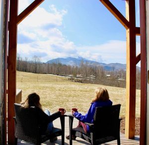 Enjoying the view of mt mansfield from the mansfield house