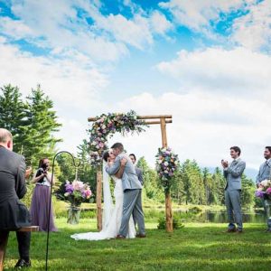 Couple's first kiss at their Sterling Ridge Resort wedding
